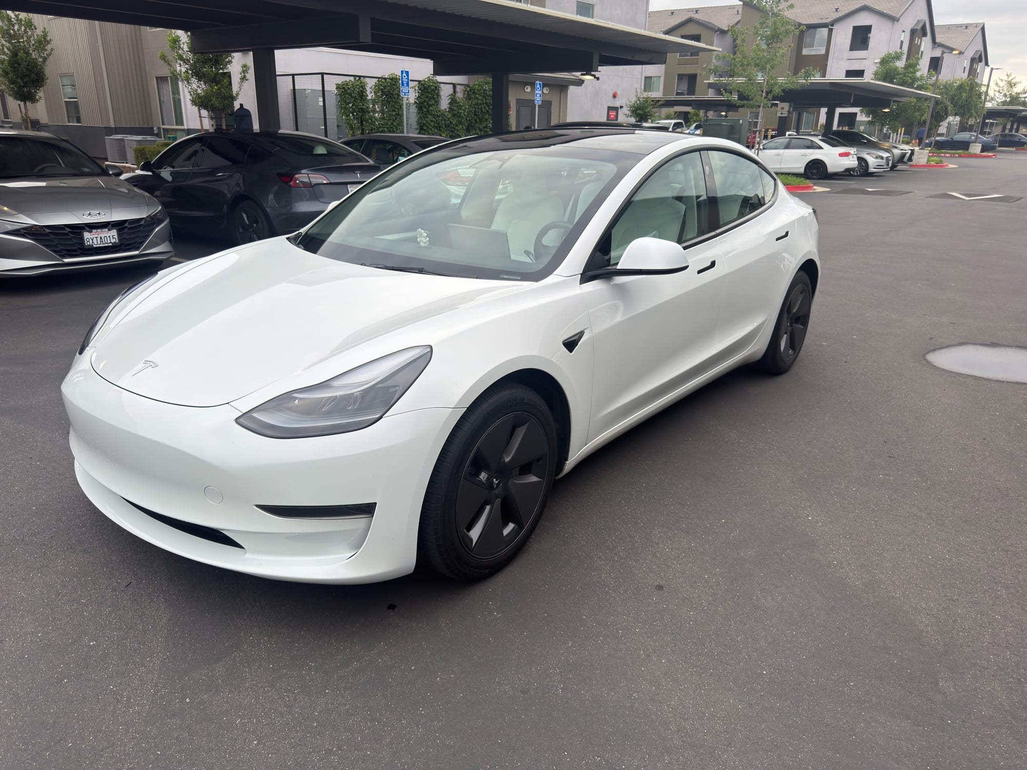 2023 Tesla Model 3 Rear-Wheel Drive in Pearl White — photo 2 of 5