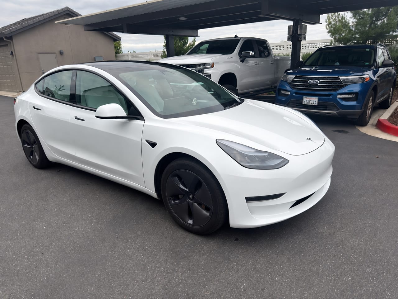 2023 Tesla Model 3 Rear-Wheel Drive in Pearl White — photo 1 of 5