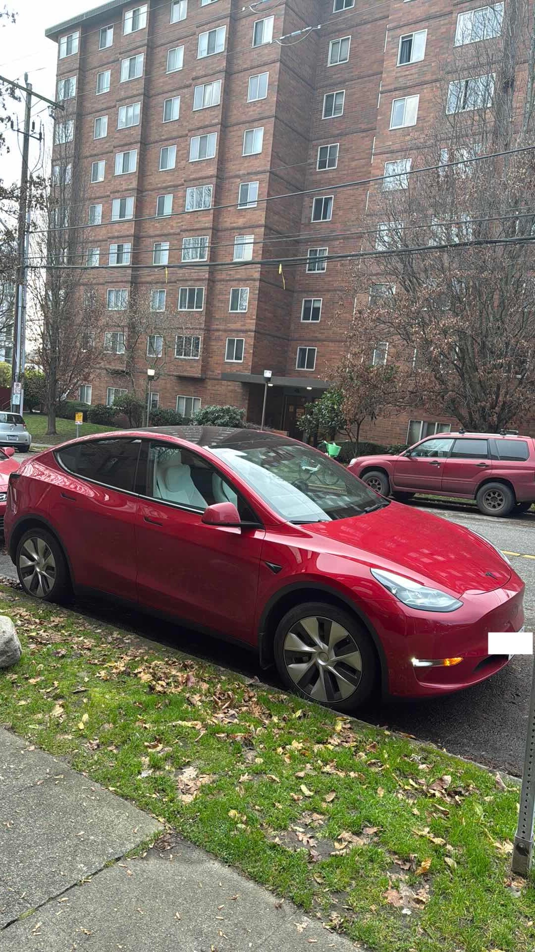 2023 Tesla Model Y Long Range All-Wheel Drive in Red Multi-Coat — photo 2 of 5