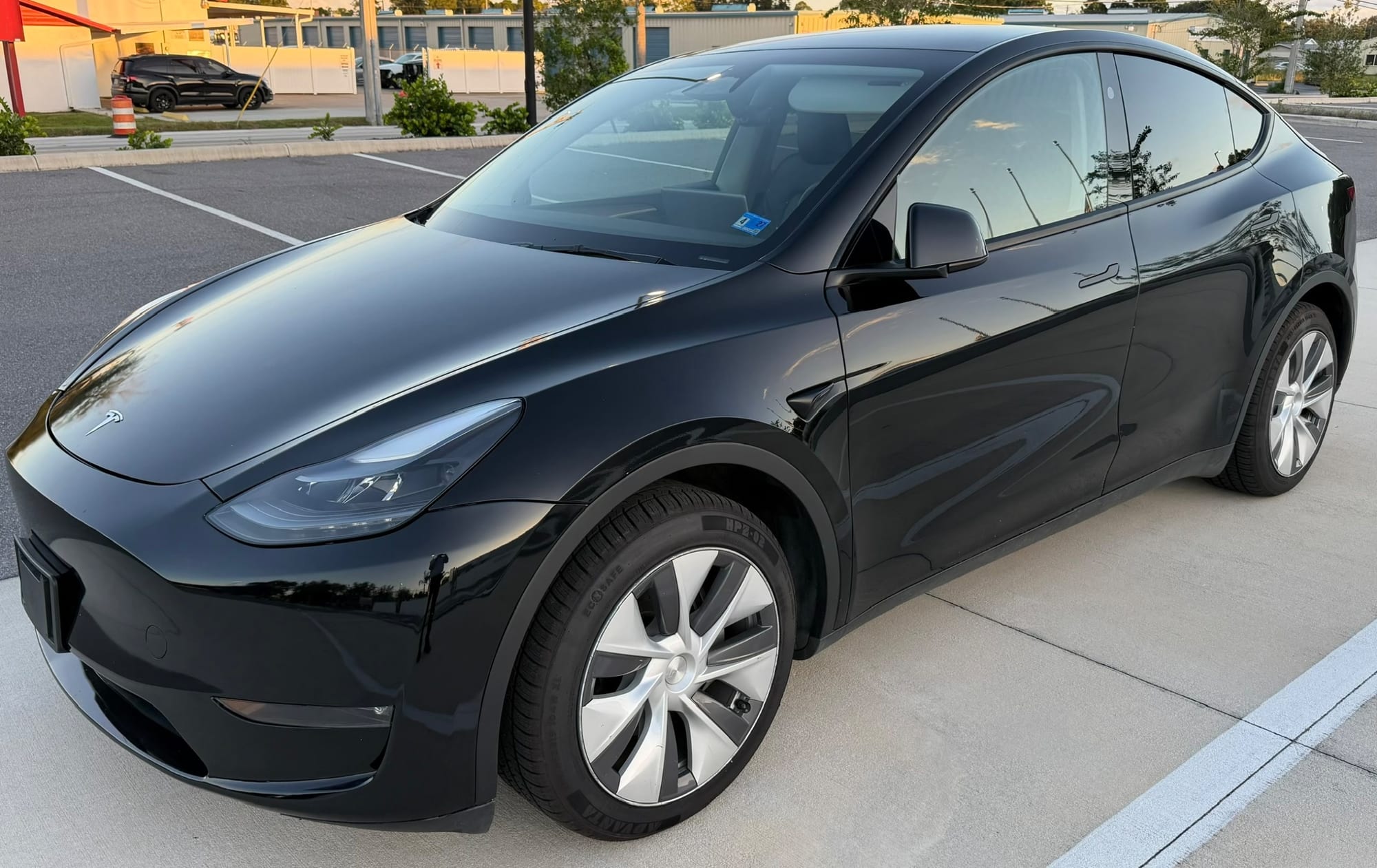 2023 Tesla Model Y Long Range All-Wheel Drive in Solid Black — photo 1 of 11