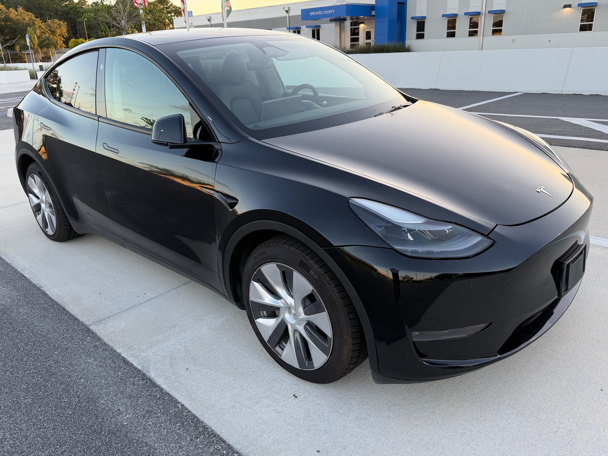 2023 Tesla Model Y Long Range All-Wheel Drive in Solid Black — photo 2 of 11